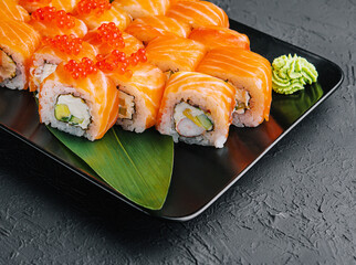 Philadelphia roll sushi with salmon, prawn, avocado, cream cheese