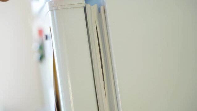 Cracked rubber seal on the refrigerator door, close-up