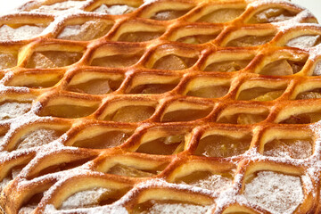 Sweet lattice galette with custard, caramelized apples and sugar dusting