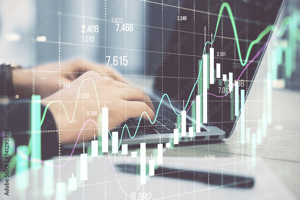 Poster close up of businessman hands using laptop at desk with growing forex chart on blurry background. fi