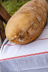 Traditional sheep cheese from Romania, known as bellows cheese in cow belly leather