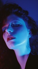 Stylish makeup with Blue Eyeshadow. Woman with blue glam makeup