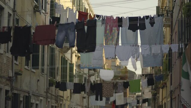 Stretching across the buildings and balconies were countless rows of laundry lines, displaying the nation's attire. In Italy, it's customary to air-dry laundry outdoors.