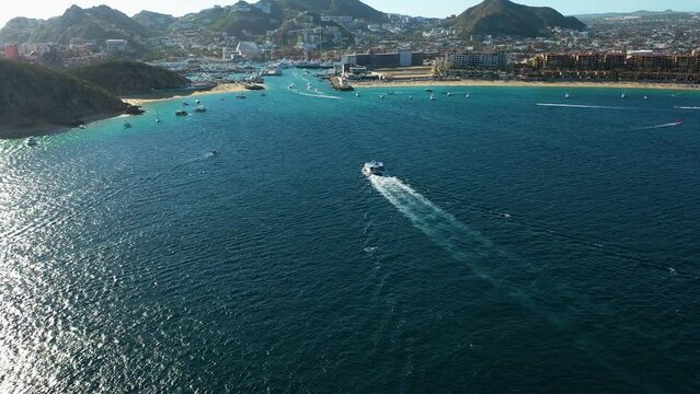 Aerial view approaching ferry arriving in Cabo San Lucas, sunny day in Mexico