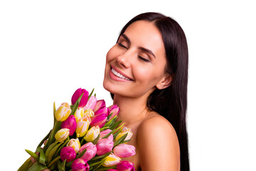 Close-up portrait of her she nice cute attractive lovely winsome charming fascinating cheerful brunette hispanic lady smelling colorful flowers closed eyes advert isolated on pink pastel background