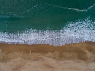 wave breaking on the beach