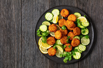 fried rice cutlets, rice tikki on black plate