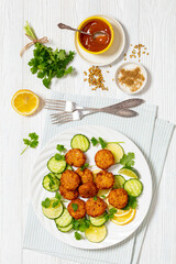 fried rice cutlets, rice tikki on white plate