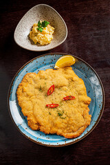 Pork breaded cutlet coated with breadcrumbs