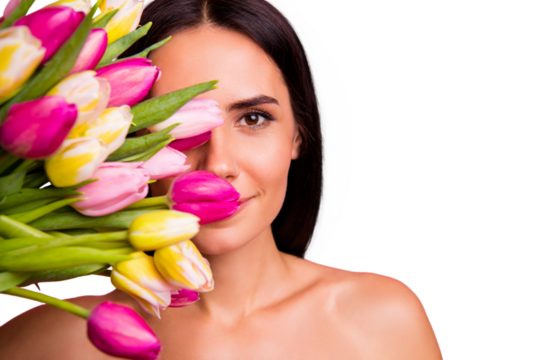 Close-up portrait of her she nice cute pure adorable sweet attractive lovely cheerful dreamy brunette lady half face hiding behind early natural flowers isolated on pink background