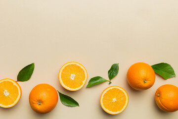 fresh Fruit orange slices on colored background. Top view. Copy Space. creative summer concept. Half of citrus in minimal flat lay with copy space