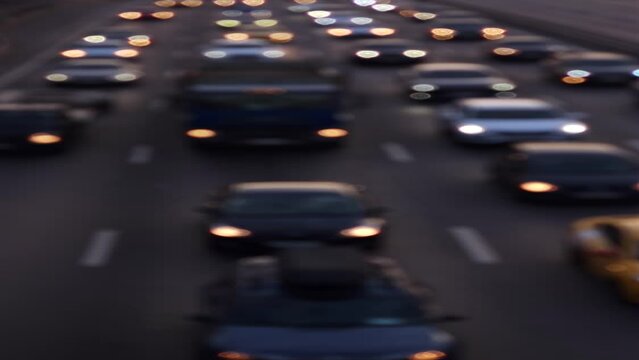 Heavy city traffic at night representing urban congestion, rush hour, modern transportation, and business lifestyle concept