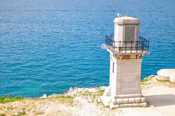Lighthouse on the coast of the Adriatic Sea in Rovinj town Croatia