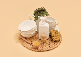 Dishes assortment on a wicker mat. Washing dishes, housework and hygiene.