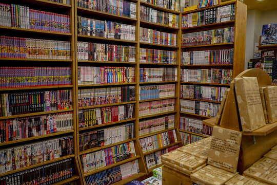 bookshelves full of mangas , animes and popular japanese comic books , Paris, France 6 june 2023