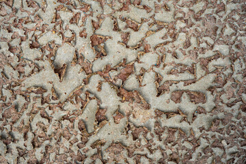 Peeling off of the sedimentary on the cement floor after the flood has dried up