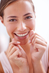Woman, teeth and floss in portrait for dentistry with closeup, morning and cleaning mouth for...