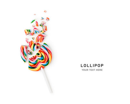 Broken lollipop candy isolated on white background.