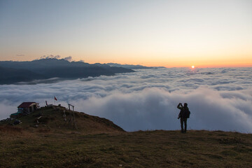 Swinging (Salincak) in the Sea of ​​Cloud at Sunset, Huser Plateau (Huser Yaylası) Çamlıhemşin Rize, Turkiye (Turkey)