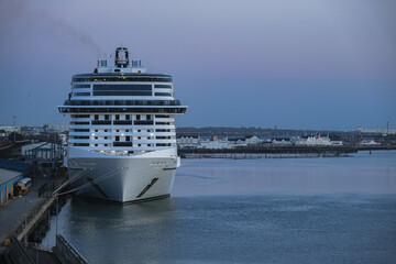 Mega modern cruise ship cruiseship liner Virtuosa in port of Southampton, Britain sail away for...