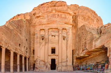 The carved out exterior of the Urn Tomb in Petra, Jordan.