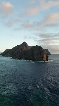 Aerial view of rocky coastline at sunset, Ponta da Calheta, Porto Santo Island, Portugal.
