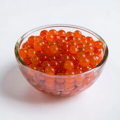 red caviar in a glass bowlon white background