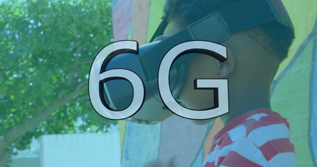 Image of 6g text over boy wearing vr headset in playground