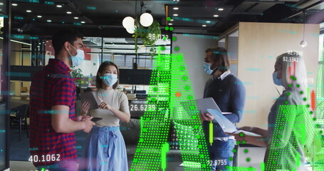 Image of data processing over diverse business people wearing face masks and discussing