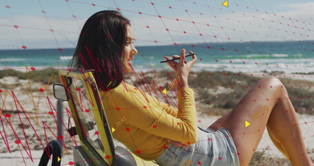 Image of data processing over caucasian woman using smartphone