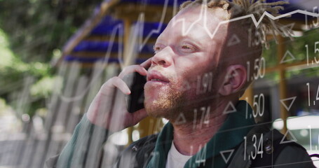 Image of data processing over albino african american man using smartphone