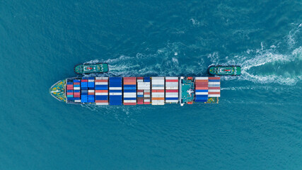 Cargo Container Ship running with with Tugboat. container ship import export to customers sea port....