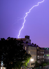 Lighning bolt over night sky in central Europe, Austria.