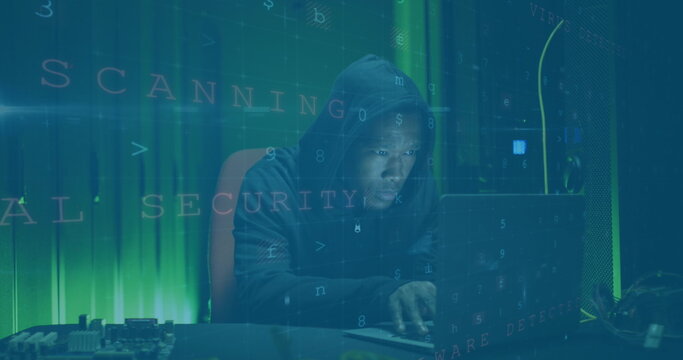 Image of data processing over african american male hacker - Powered by Adobe
