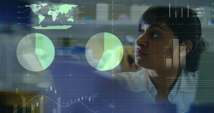 Image of floating diagrams, circles, world map and data processing over mixed race female doctor exa - Powered by Adobe