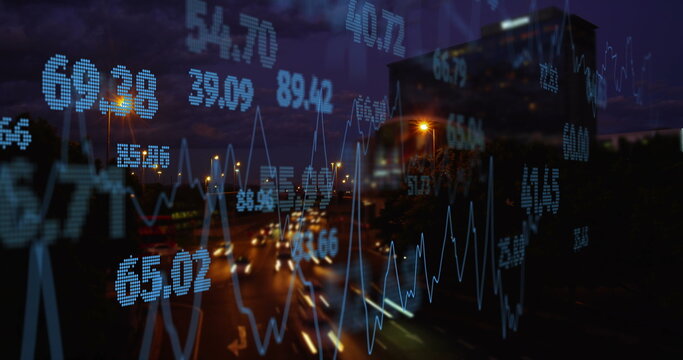 Image of financial data processing over cityscape