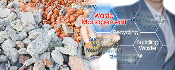 Recovery and recycling of concrete and brick rubble debris on construction site after a demolition...