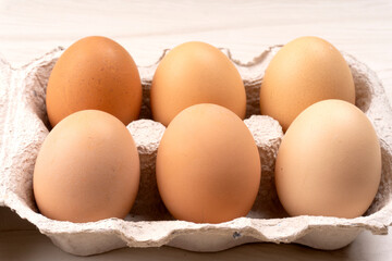 Organic chicken eggs on the table. Eggs are good for everyone and health. Farm products, natural eggs.