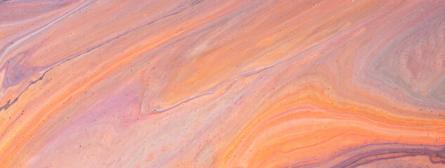 Abstract fluid art background light coral and purple colors. Liquid marble. Acrylic painting with peach gradient