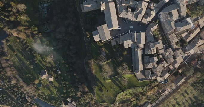 Aerial view of Orvieto at sunset, a small town perched on the rock cliff in Umbria, Terni, Italy.