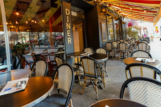 Paris , france 6 june 2023 : terrace of a fancy restaurant and brasserie , parisian lifestyle