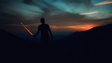 spectacular sunset in the mountains with the silhouette of a man holding a laser sword