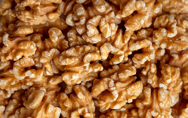 Closeup of Peeled Walnuts Pile. Walnuts Background
