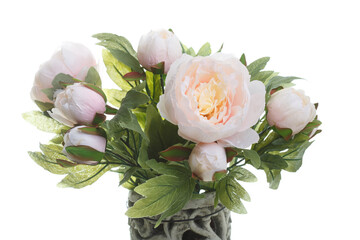 Delicate bouquet of artificial peonies isolated on a white background.