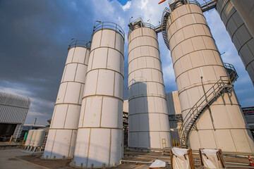 Barrels silo stock chemical products The metal barrels are white.Manufacture of chemicals