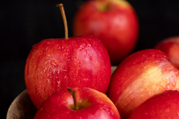 clean wet red apples , close-up
