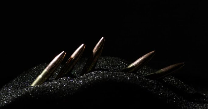 300 BLK Bullets Standing On Line In Smokeless Gunpowder. Close Up Shot