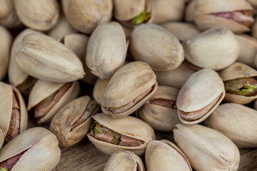 Salted fried pistachios on the table