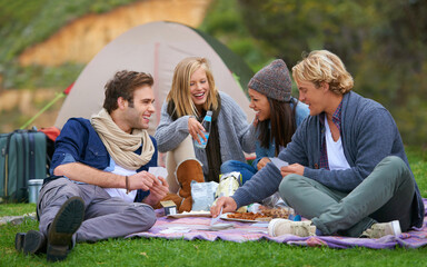 Nature, camping and people on picnic with food laughing, talking and bonding on vacation. Happy,...