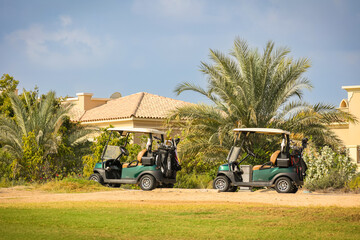 Golf cart on the course, Golf Carts, Golf course, background, luxury , Dubai city, Green , lifestyle